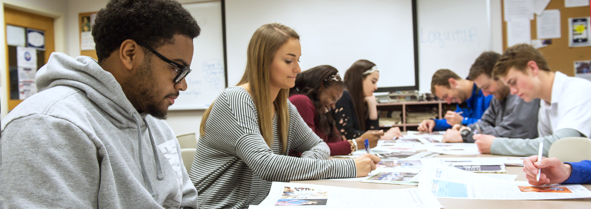 Cabrini students working on the student newspaper, The Loquitur
