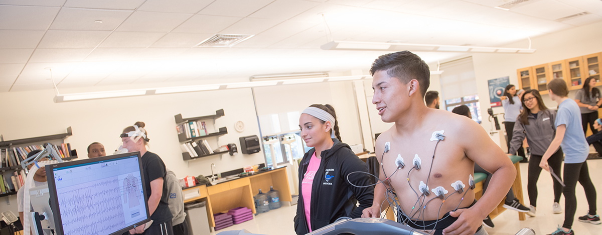 Cabrini students in an ESH class using heart-monitoring equipment