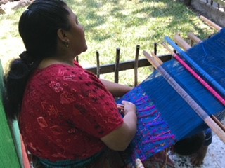 Woman in Guatemala weaving