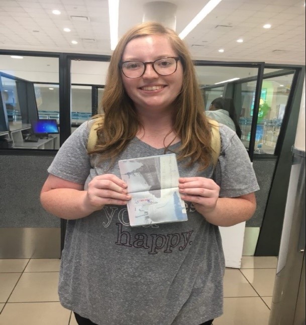 Rachel with passport stamped