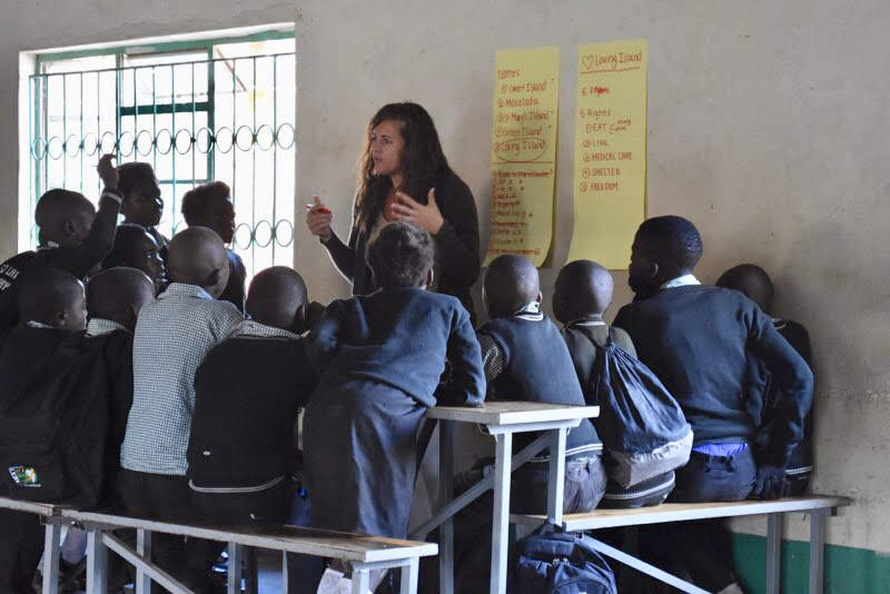Sheila teaches students in Zambia