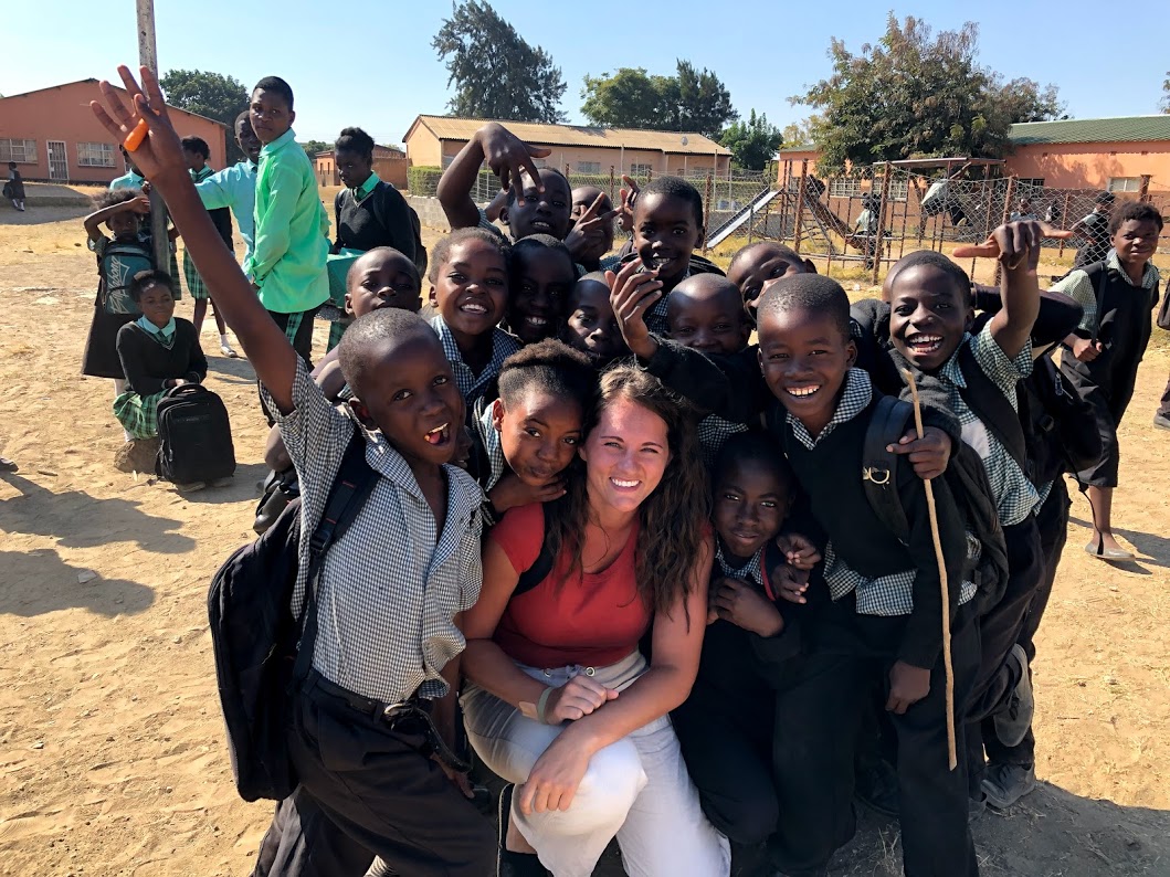 Sheila with students in Zambia