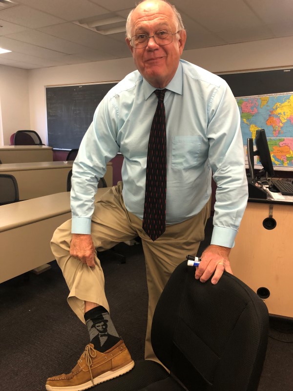 Dr. Hedtke wearing his Abraham Lincoln socks during his American CIvil War class